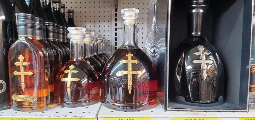 Discount Liquor King store aisle stocked with liquor bottles