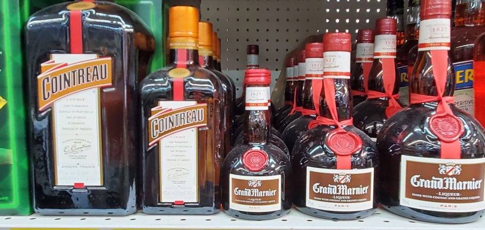Well-organized liquor store aisles