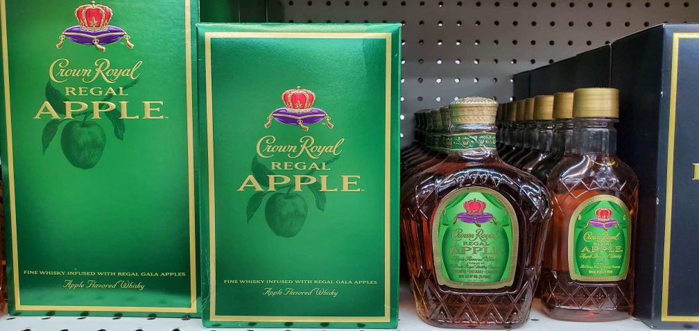 Liquor store shelves filled with whiskey and bourbon